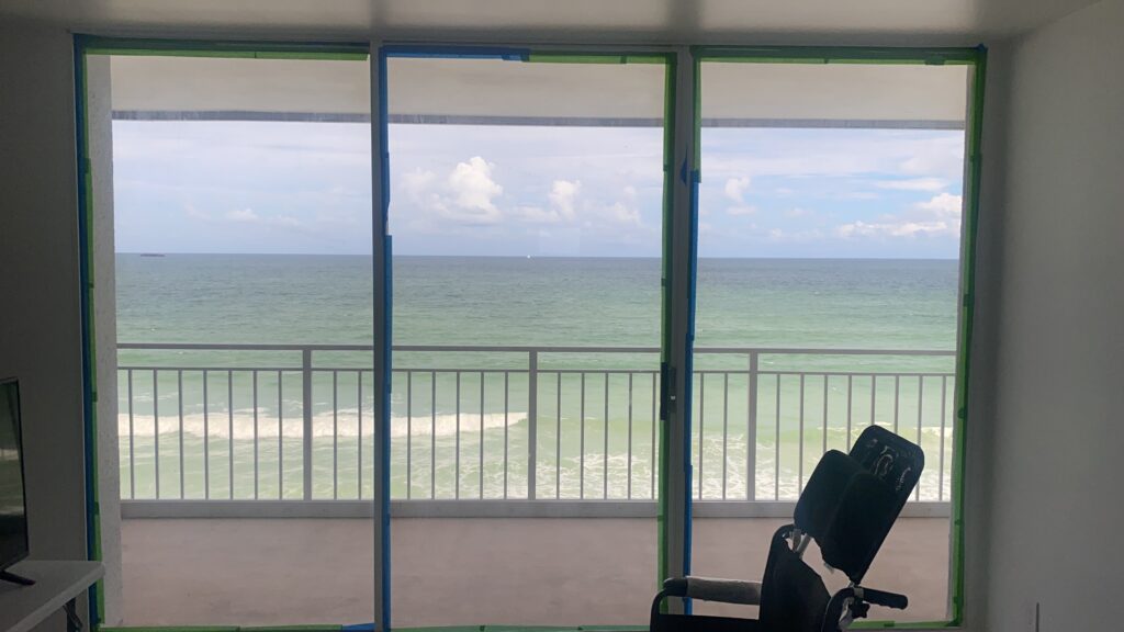 Alpha Sliding Doors installing sliding glass doors at an oceanfront Florida high-rise condo